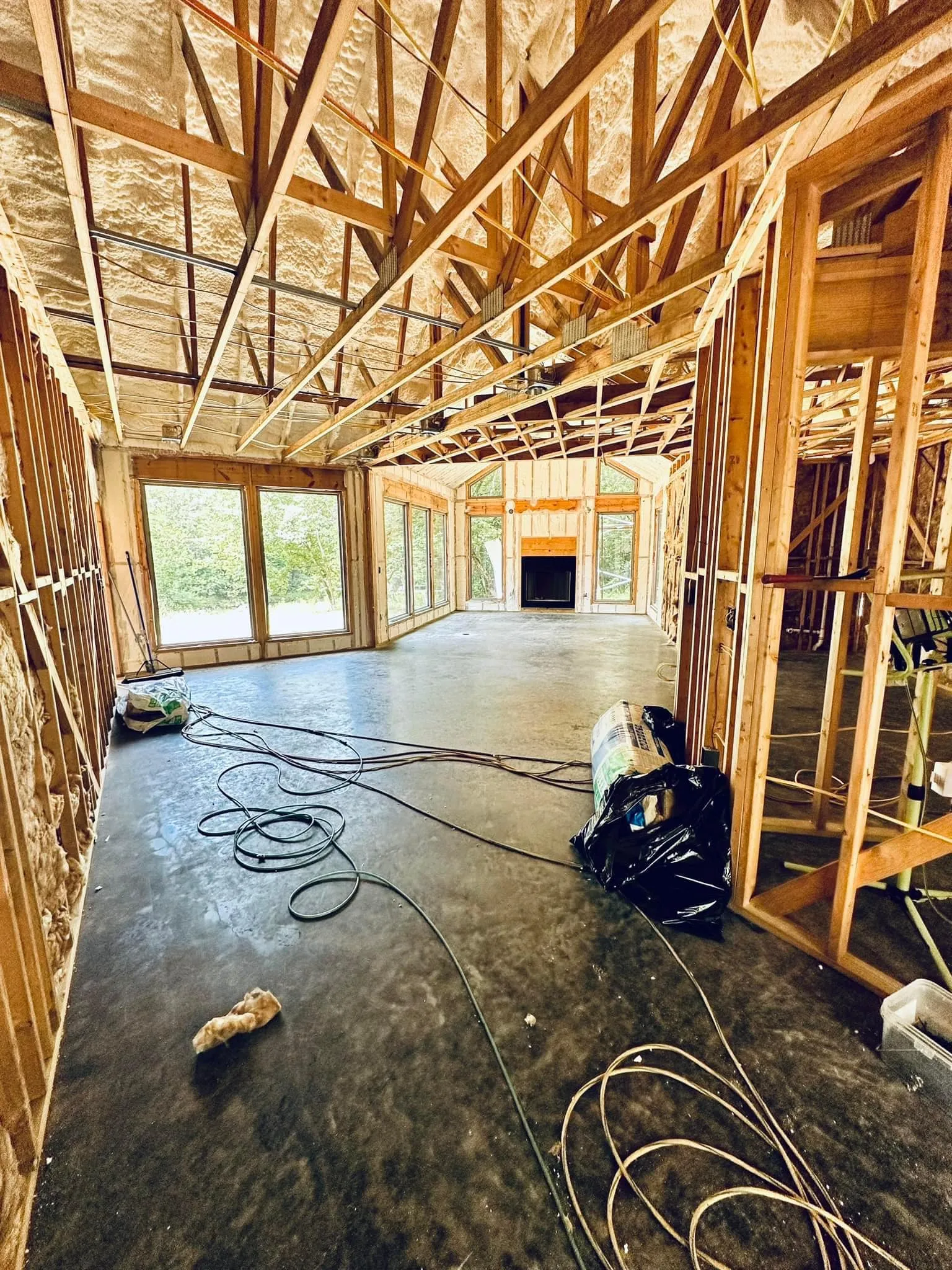What Happens to Electrical Wires and Pipes During a Spray Foam Application?